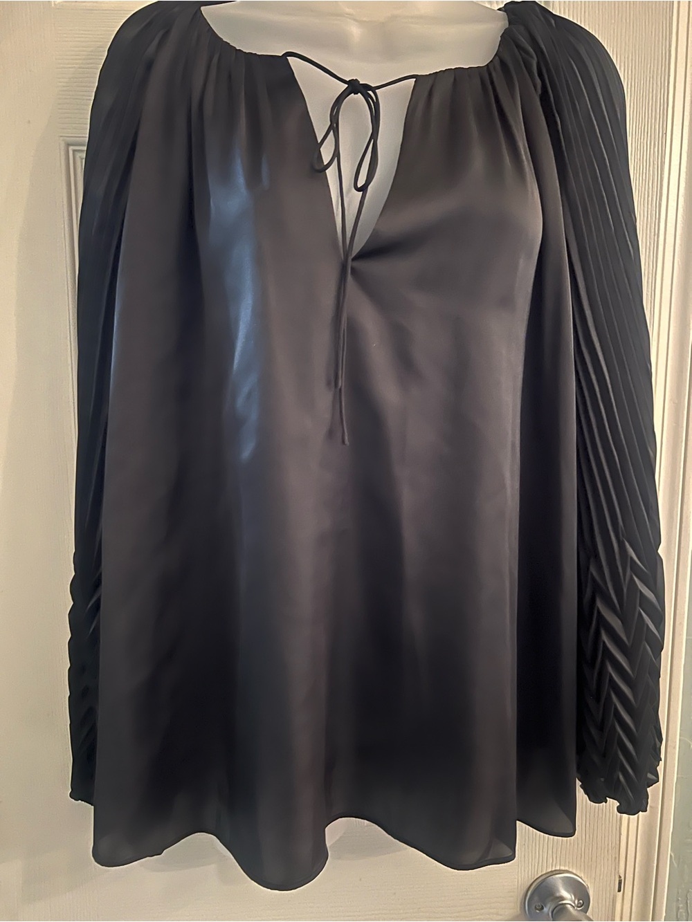 Johnny was nwt Gemma pleated blouse black nwt. Large